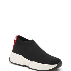 Brand new never worn DKNY black sneakers